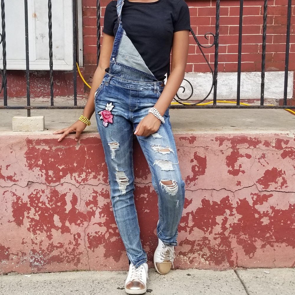 Denim overalls with flower patch